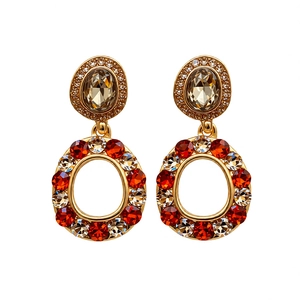 Vintage gold-plated hollow earrings with champagne oval crystal and sparkling rhinestones