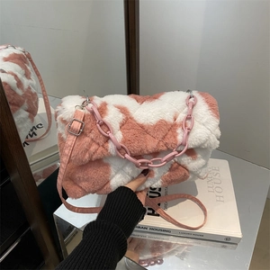 Plush pink and white checkerboard shoulder bag with acrylic chain and soft faux fur texture