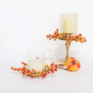 Halloween candle ring with orange berries, gold metal stand and amber glass shade set