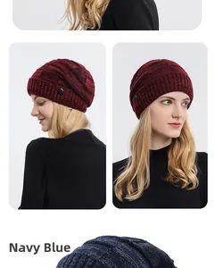 Detail of winter knitted beanie with decorative side buttons and textured burgundy wool