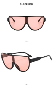 Front and side views of black oversized shield sunglasses with stylish pink red lenses