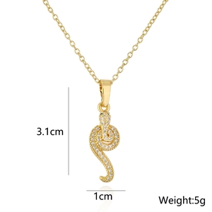 Detailed size view of the 18K gold snake pendant with cubic zirconia and 3.1cm length