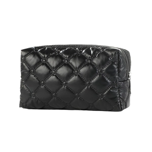 Quilted black puffer cosmetic bag with diamond stitching and top zipper closure