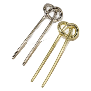 Minimalist U-shaped metal hairpins set with knot detail in gold and silver finishes