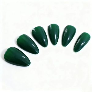 Glossy emerald green almond shaped press-on nails with luxury translucent glass finish