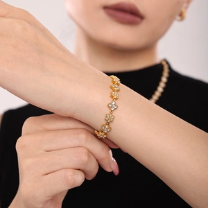 Elegant 18k gold plated stainless steel flower bracelet with sparkling zircon on wrist