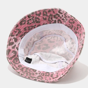 Detailed interior of pink leopard print cotton bucket hat with 100% cotton label