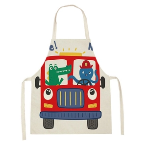Close-up of beige linen child apron with red fire truck cartoon print and neck strap