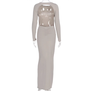 Detail of the elegant backless cutout and waist ruching on the long slim-fit dress