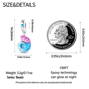Luminous shell charm bead dimensions 26.6x14.2mm with size reference next to a coin