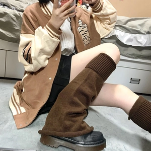 Detailed knit texture of dark brown thick y2k slouch leg warmers for women