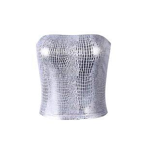 Detail shot of silver metallic tube top featuring embossed snakeskin texture and shine