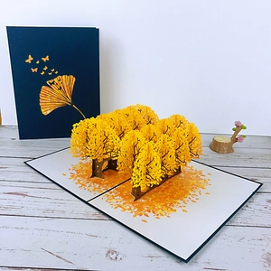 3D pop-up greeting card featuring a yellow ginkgo forest and blue cover design