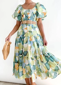 Detail of square neckline with ruched chest and colorful geometric dot print on puff sleeve dress