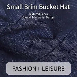Navy blue striped denim bucket hat for women with minimalist style and textured fabric
