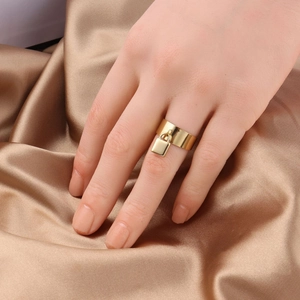 Classic gold stainless steel wide band ring with a stylish hanging padlock charm for women