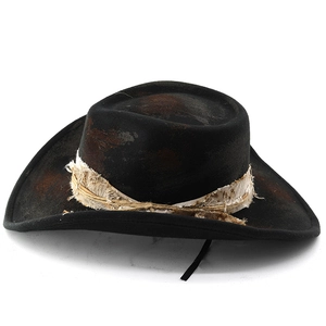 Retro black distressed wool cowboy hat with vintage textured crown and fringed band