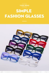 Collection of oversized cat-eye anti-blue light glasses in various colors on yellow background