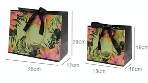 Size guide for floral gift bags showing large 25x20cm and small 18x16cm dimensions
