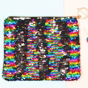 Regenboog omkeerbare pailletten cosmetische tas met gouden rits op blauw-roze achtergrond