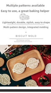 Macro detail of Christmas fondant molds with Happy Holidays and From Santa engravings