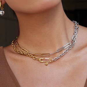 Double-layered 18K stainless steel paperclip necklace with heart pendant on model
