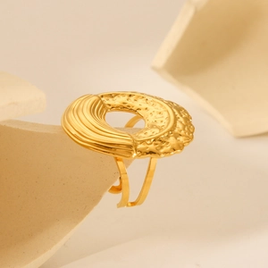 Artistic hammered stainless steel open ring with textured folds and gold finish