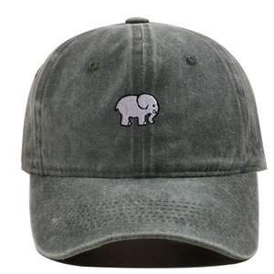 Detail of elephant embroidery on a vintage washed cotton baseball cap in dark grey