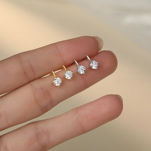 Minimalist S999 sterling silver stud earrings with sparkling round zircon stones