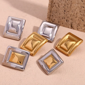 Minimalist geometric square stud earrings in 18K gold and silver finish with textured base