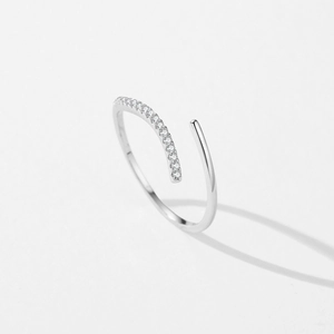 Minimalist S925 sterling silver adjustable open ring with pave diamonds on grey background