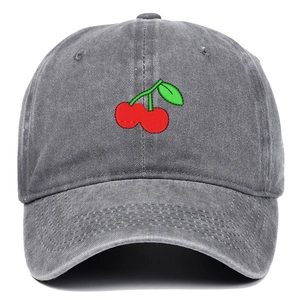 Close-up of cherry embroidery on vintage washed dark gray cotton baseball cap
