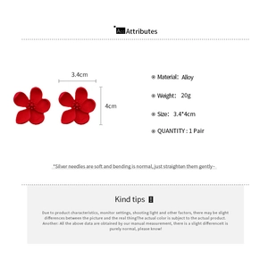 Detailed specs of red matte flower petal earrings with alloy material and silver needles