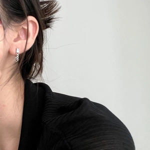 Elegant 925 sterling silver chain earrings with square zircon stone on female model