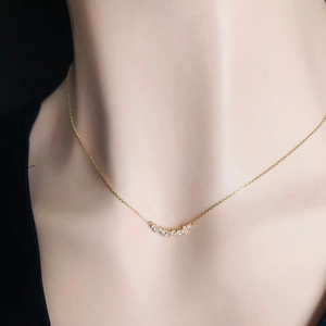 Elegant 925 sterling silver smile necklace with micro-pave crystals on a thin gold chain
