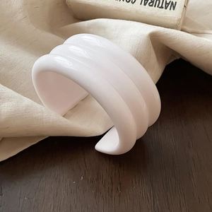 Minimalist white three-layer ribbed resin open cuff bracelet with cream gloss finish