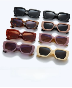 Detailed flat lay of thick rectangle sunglasses in eight diverse fashion colors