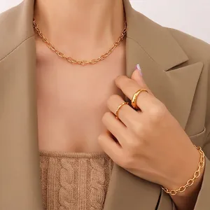 Chunky link necklace and bracelet set with 18K gold plated rings on model