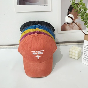 Vintage washed cotton baseball caps with GOD WINS embroidery in multiple colors