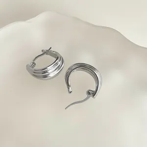 French vintage style silver rippled hoop earrings with minimalist tiered U-shape design