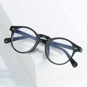 Classic black round frame blue light blocking glasses with stylish rivet accents
