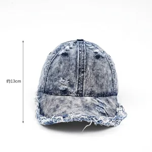 Vintage washed blue denim baseball cap with distressed frayed edges and deep 13cm crown