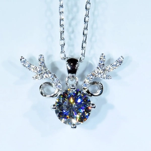 Macro shot of 2-carat zircon pendant with elk antler design and sparkling brilliant cut