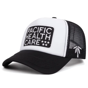 Retro Pacific Health Care embroidered black and white trucker hat with mesh and palm tree detail