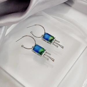 Irregular opal moonstone earrings with liquid silver aesthetic and blue-green gradient gems