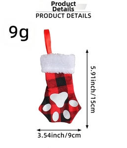 Detail view of 15cm cat paw Christmas stocking with red buffalo plaid and plush trim