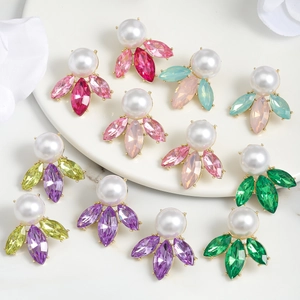 Luxurious gold earrings set with multi-color teardrop gemstones and elegant pearls
