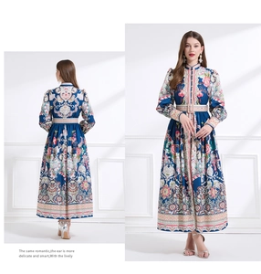 Detailed view of vintage long-sleeve floral maxi dress with mandarin collar and waist belt