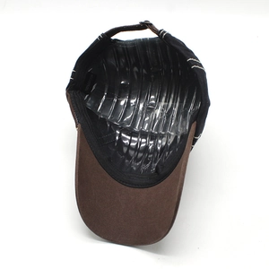 Internal view of bicolor cotton baseball cap with anchor embroidery and 100% cotton label