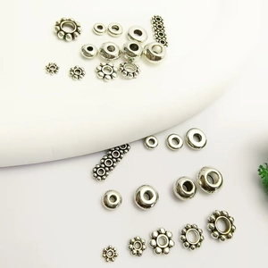 Collection de perles d'espacement flocon de neige en argent tibétain pour bijoux DIY